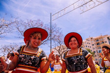25th INTERNATIONAL VILLAGES FAIR in Fuengirola. The multicultural parade, in which all the delegations at each edition of? FIP? take part Andalusia, Spain. Picture taken? 1 May 2019.のeditorial素材
