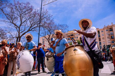 25th INTERNATIONAL VILLAGES FAIR in Fuengirola. The multicultural parade, in which all the delegations at each edition of? FIP? take part Andalusia, Spain. Picture taken? 1 May 2019.のeditorial素材