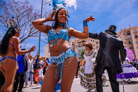 25th INTERNATIONAL VILLAGES FAIR in Fuengirola. The multicultural parade, in which all the delegations at each edition of? FIP? take part Andalusia, Spain. Picture taken? 1 May 2019.のeditorial素材