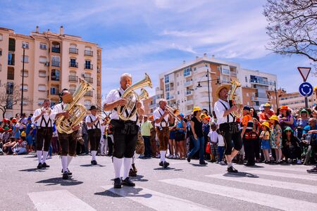 25th INTERNATIONAL VILLAGES FAIR in Fuengirola. The multicultural parade, in which all the delegations at each edition of? FIP? take part Andalusia, Spain. Picture taken? 1 May 2019.のeditorial素材