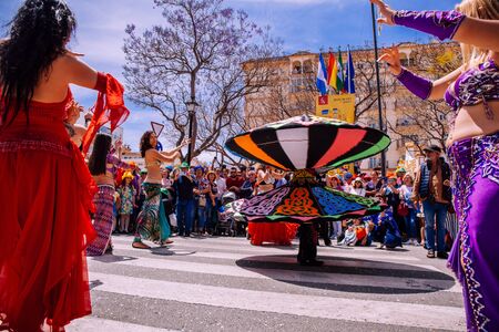 25th INTERNATIONAL VILLAGES FAIR in Fuengirola. The multicultural parade, in which all the delegations at each edition of? FIP? take part Andalusia, Spain. Picture taken? 1 May 2019.のeditorial素材