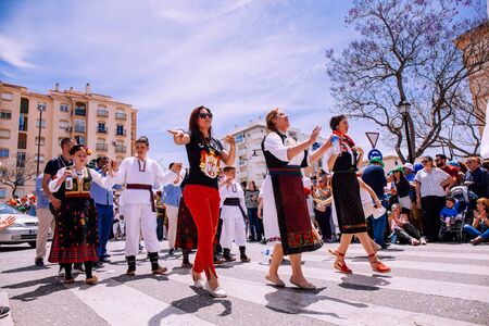 25th INTERNATIONAL VILLAGES FAIR in Fuengirola. The multicultural parade, in which all the delegations at each edition of? FIP? take part Andalusia, Spain. Picture taken? 1 May 2019.のeditorial素材