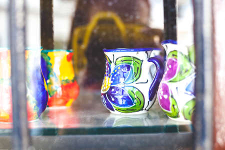 Souvenir shop. Gifts displayed outside a souvenir shop in the village center Mijas. Andalusia, Spain. Picture taken - 04.04.2021.のeditorial素材