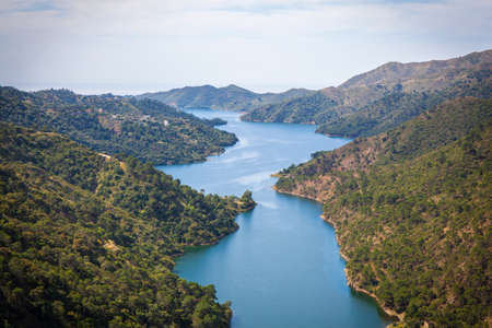 Elevated view across La Concepcion reservoir. Marbella, Malaga Province, Andalusia, Spain.の写真素材
