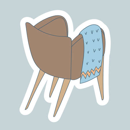 Cozy Armchair with a blanket in Scandinavian style. European Furniture and home decor. Winter Hygge. Hand drawn linear cartoon illustration on white background. Sticker design.のイラスト素材