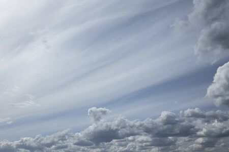 Cumulus clouds against a blue sky. Background and Wallpaper for desktop