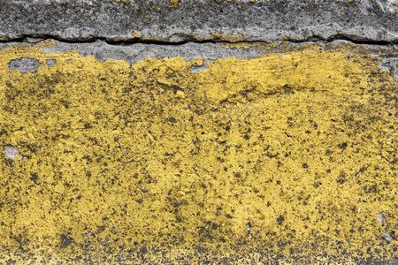 background and texture of old concrete wall with cracked paint on itの写真素材