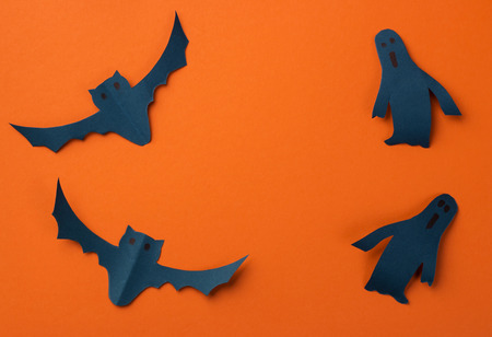 Halloween holiday background with paper bats and ghosts. View from aboveの写真素材