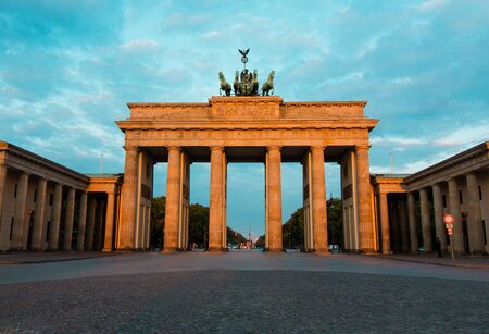 Berlin, Germany - 06.09.2018. Famous Brandenburger Tor (Brandenburg Gate) in beautiful golden morning light at sunrise.のeditorial素材