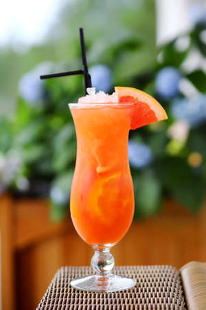 Juicy Orange and Red Tequila Sunrise with a Cherryの写真素材