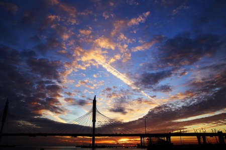 pontoon bridge in St. Petersburg at sunset in autumnの写真素材