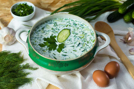 Okroshka on kefir. Traditional East Slavic cold vegetable soup with kefir and boiled egg.の写真素材
