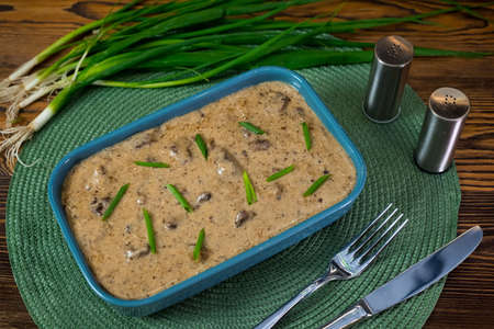 Beef Stroganoff in sauce garnished with chopped green onions. Ready to be served.の写真素材