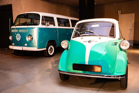 BMW Isetta and a Minivan Retro car stands in an exhibition at museumのeditorial素材