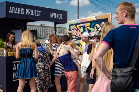 Moscow, Russia â August 06 2016: Faces & Laces Street Culture - young people walking through a festival of street fashion and culture. bright sunshine, hot summer, good weather.のeditorial素材