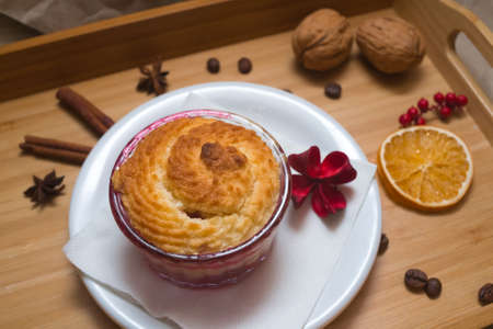 Christmas dessert serving of plum baked pie in ramekin