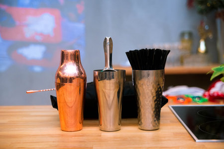 A set of cocktail items from the bartenders. Glass with straws.の写真素材