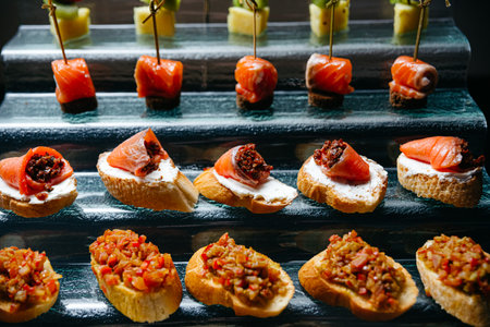 A display case filled with different types of appetizers: A Delicious Assortment of Appetizers and Crostiniの写真素材