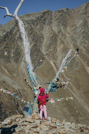 Tirol,Austria - September 1, 2023: Austrian mountains, Childrens hiking in the mountains.のeditorial素材