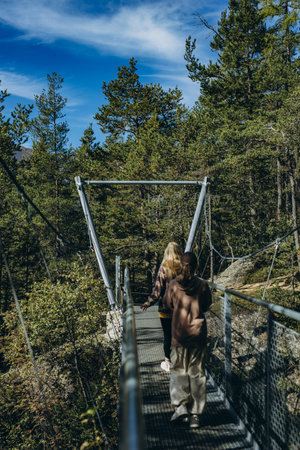 Tirol,Austria - September 1, 2023: Austrian mountains, Childrens hiking in the mountains.のeditorial素材