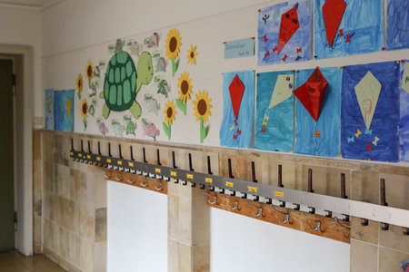Schwabisch Gmund, Germany-November 12,2022:childrens drawings hanging in the hallway of a German school.のeditorial素材