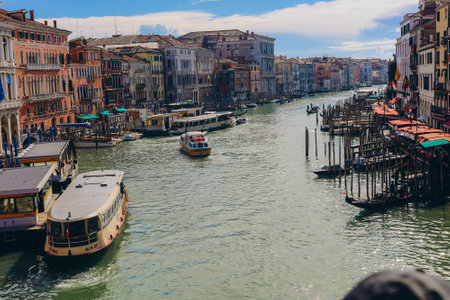 Venice, Italy - april 2,2023: Venice Grand Canal, tourists riding gondolas