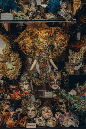 Venecia, Italy- Italy 2,2023:Venetian masks in store display in Venice.efront with a suit