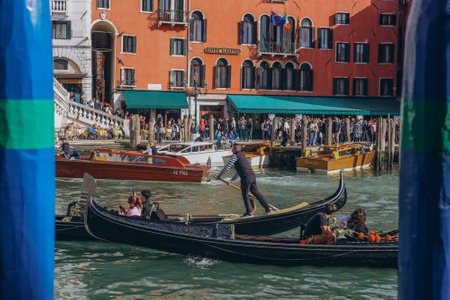 Venice, Italy - april 2,2023: Venice Grand Canal, tourists riding gondolas