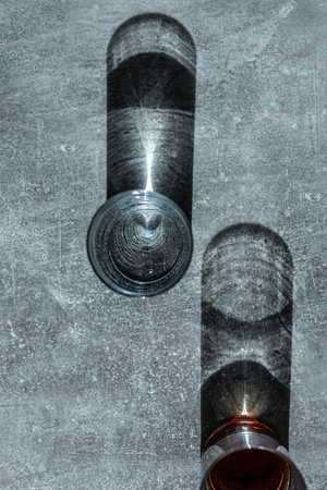 Close up pouring fresh drink from the bottle on table. High quality photoの写真素材