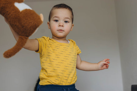 Two year old boy jumping and playing, full of energy and joy. High quality photoの写真素材