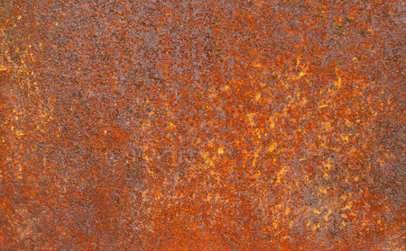 Closeup texture of the old and totally rusty metal sheet as a background