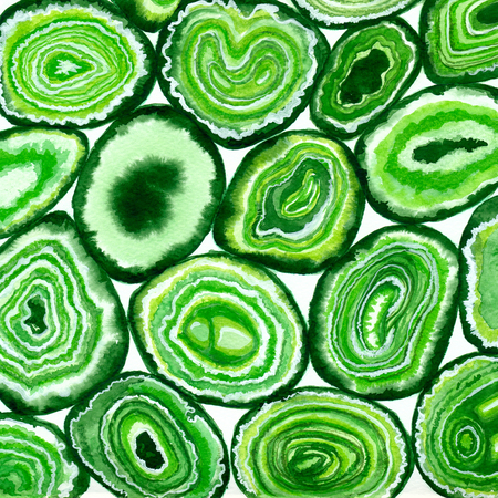 Green agate slices painted with watercolors.の写真素材