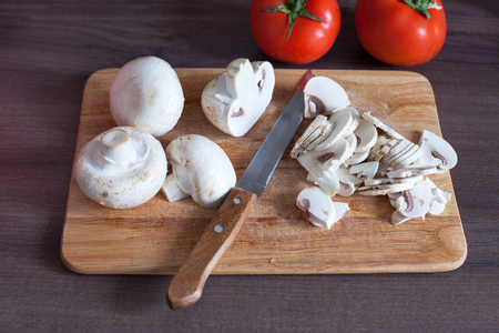 mise en place setup of ingredients for dinner on wooden cutting board before preparation, bacground diet lifestyleの写真素材