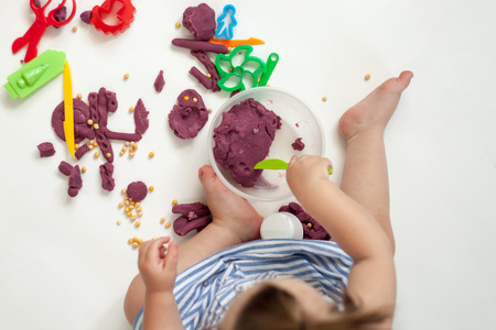 baby hands hands molded from salt dough. top viewの写真素材