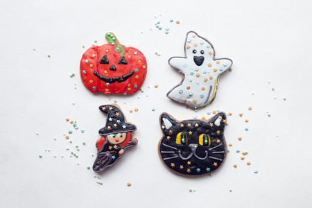 Beautiful gingerbread for Halloween on the table. horizontal view from above, minimal conceptの写真素材