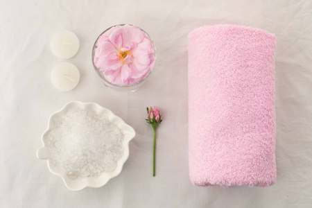 Beautiful spa composition on white tissue background. Concept of relax, wellness and mindfulness.の写真素材