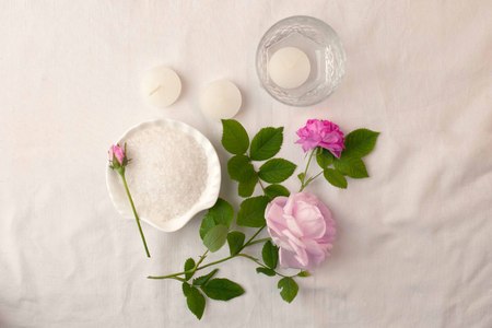 Beautiful spa composition on white tissue background. Concept of relax, wellness and mindfulness.の写真素材