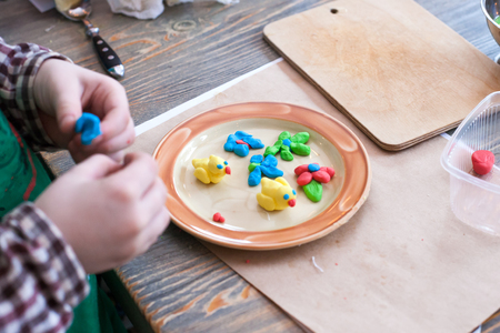culinary class for children and parents - cooking Easter cake, on the table lie the ingredients and tools for work, the cooking processの写真素材
