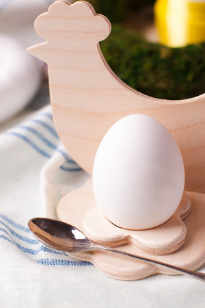 a festive Easter table, an egg serving and serving optionの写真素材