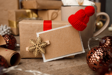 Christmas gifts with christmas decoration on vintage woodenの写真素材