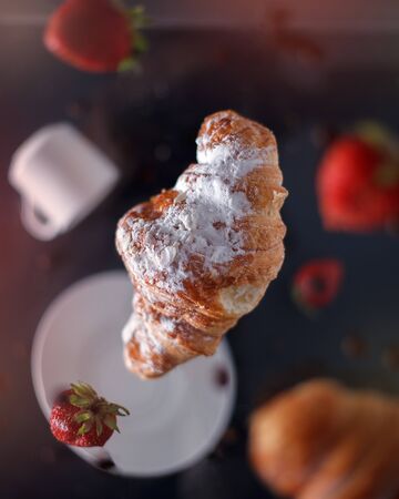 Fresh homemade croissants with strawberry and various toppings. Top view. French bakery concept.
の写真素材