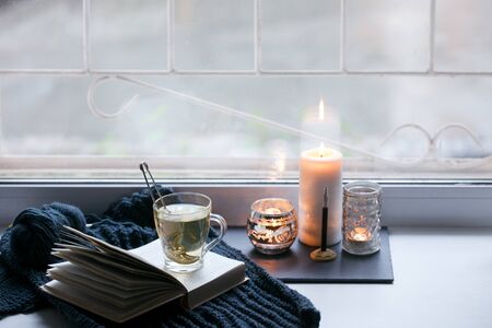 Details of still life in the home interior. Aroma stick, interior items, candles, Moody. Cosy autumn...