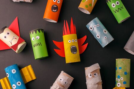 Collection of Monsters from toilet tube roll for Halloween decor. A terrible craft. School and kindergarten. Handcraft creative idea, seasonal autumn holiday patternの写真素材