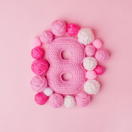 March 8 Women's Day card with number eight from crocheting knit, hobby handcraft handmade concept of...