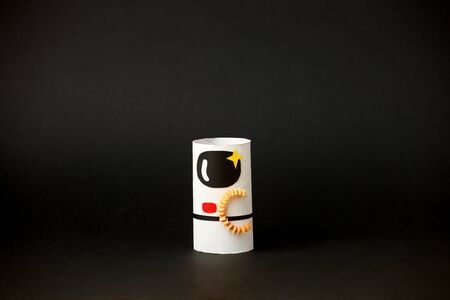 Toys astronaut on black