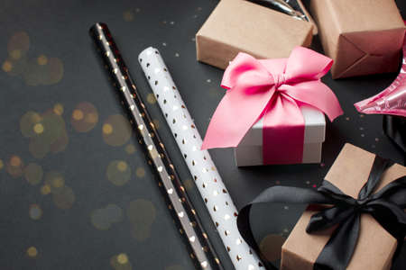 Homemade gingerbread house scene on warm blue bokeh background, Merry Christmas, Happy New Year congratulations banner, copy space, flyer, post card, voucher, couponの写真素材