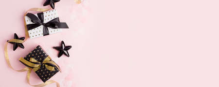 Gift or present boxes on pastel pink background, Credit card reward point, cash back, bonus for...
