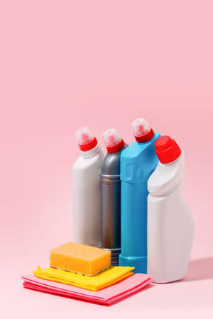 Cleaning product plastic container for house clean on pink pastel background, antibacterial...