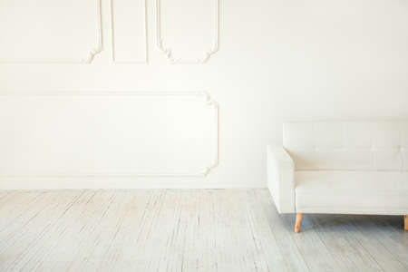Living room interior wall mock up with pastel sofa, empty white wall with free space on left, neutral beige colorsの写真素材