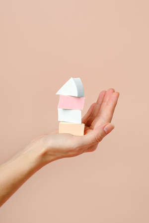 Pipette serum bottle dose of fluid hyaluronic acid with gel drops on neutral beige background....